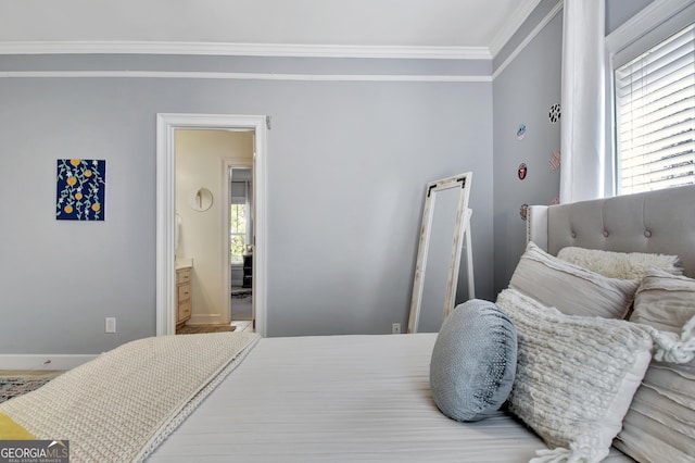 bedroom featuring crown molding