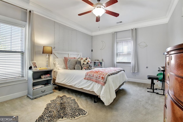 bedroom with light carpet, visible vents, and ornamental molding