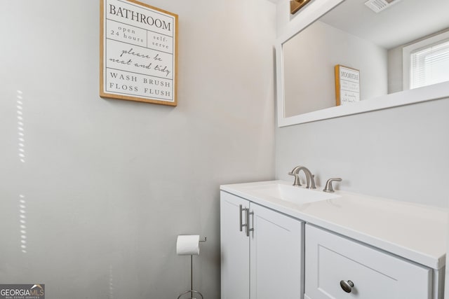 bathroom featuring visible vents and vanity