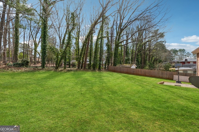 view of yard featuring fence