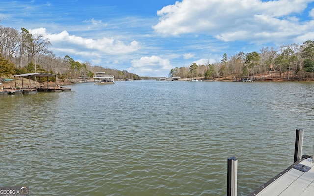 view of dock with a water view