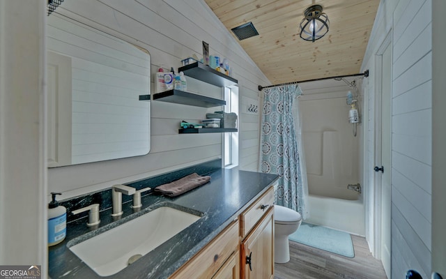 bathroom featuring lofted ceiling, toilet, wood walls, wood finished floors, and wood ceiling