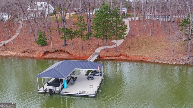 view of dock with a water view and boat lift