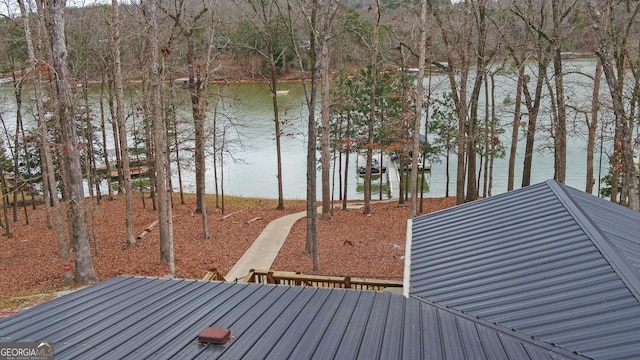 deck featuring a water view