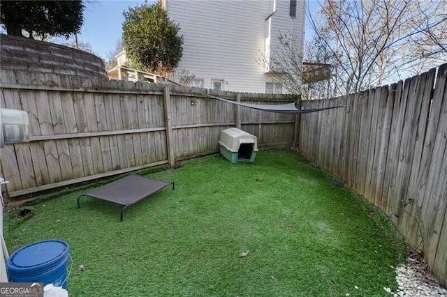 view of yard featuring a fenced backyard