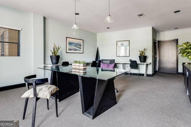 office area featuring visible vents and baseboards