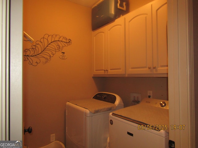 laundry area featuring cabinet space and washer and dryer