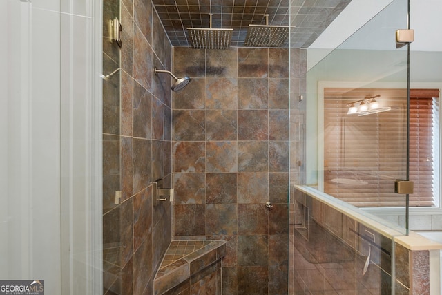 full bathroom with a tile shower