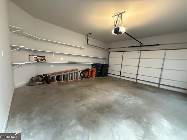 garage featuring a garage door opener