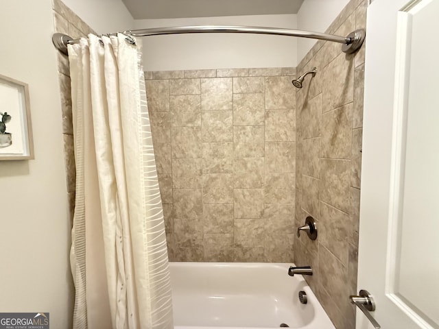 bathroom featuring shower / tub combo