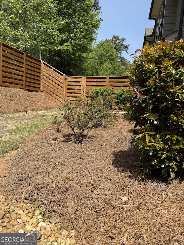 view of yard with fence