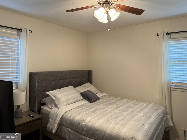 5142 Rock Eagle Dr, Stone Mountain, GA 30083 - bedroom featuring ceiling fan
