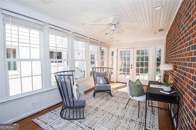 sunroom with french doors, wooden ceiling, visible vents, and a ceiling fan