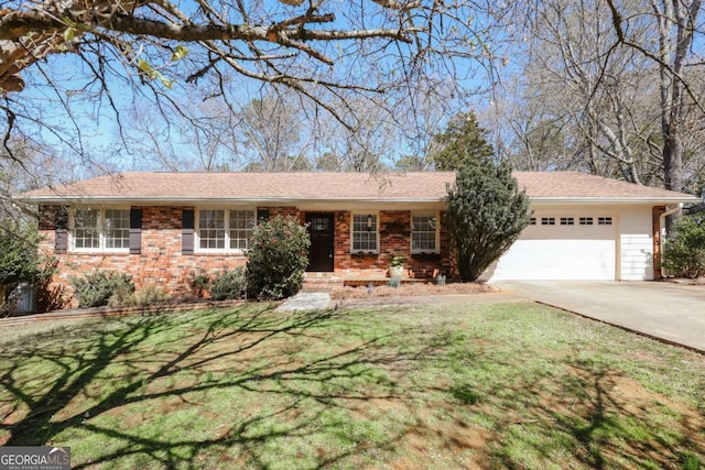 ranch-style home featuring a garage, concrete driveway, brick siding, and a front lawn