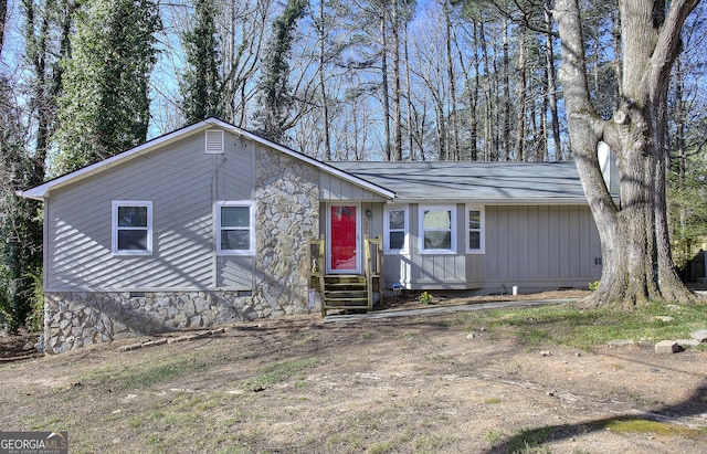 view of front of home featuring entry steps and crawl space