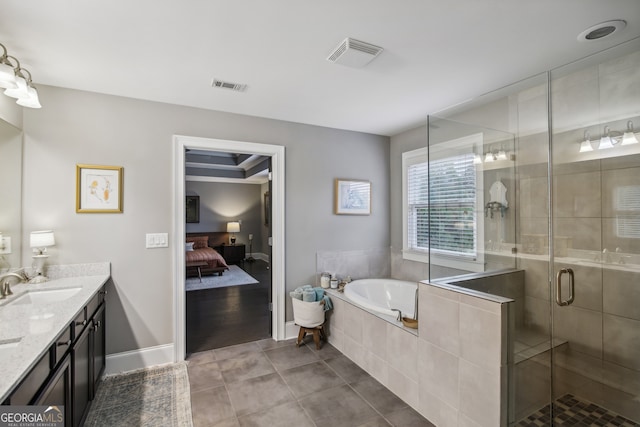 bathroom featuring a stall shower, tile patterned flooring, visible vents, and vanity