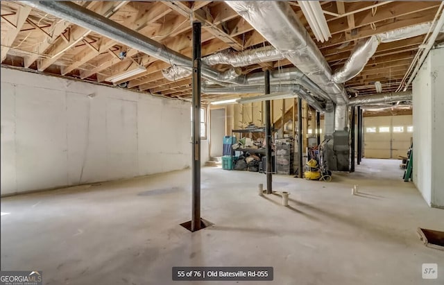 basement featuring heating unit