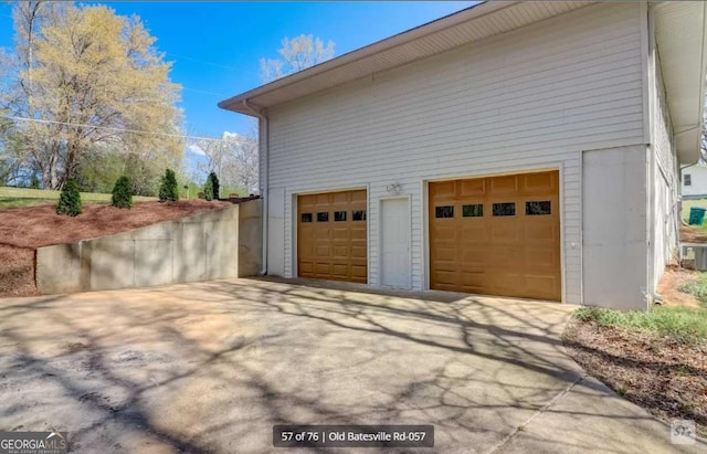 garage featuring driveway