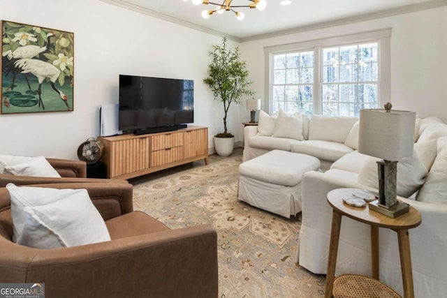 living area with ornamental molding and a chandelier