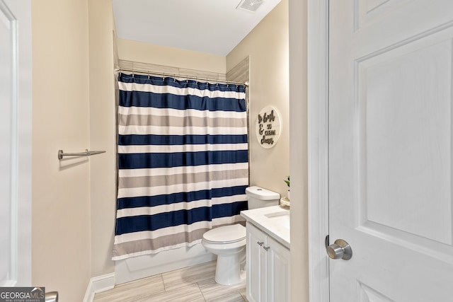 full bath with visible vents, toilet, and vanity