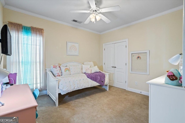 bedroom with ornamental molding, visible vents, and light colored carpet