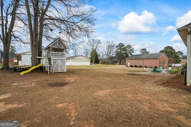 view of yard featuring a playground