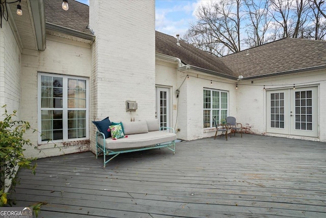 wooden terrace featuring french doors