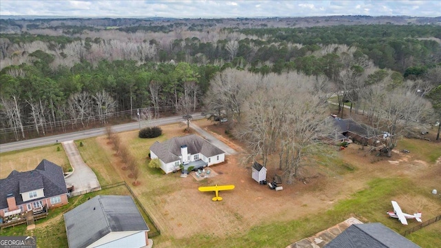 bird's eye view with a view of trees