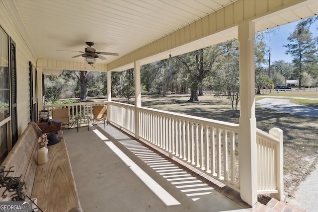 view of patio featuring covered porch and a ceiling fan