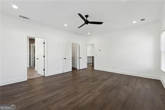 unfurnished bedroom featuring recessed lighting, dark wood-type flooring, baseboards, and ornamental molding