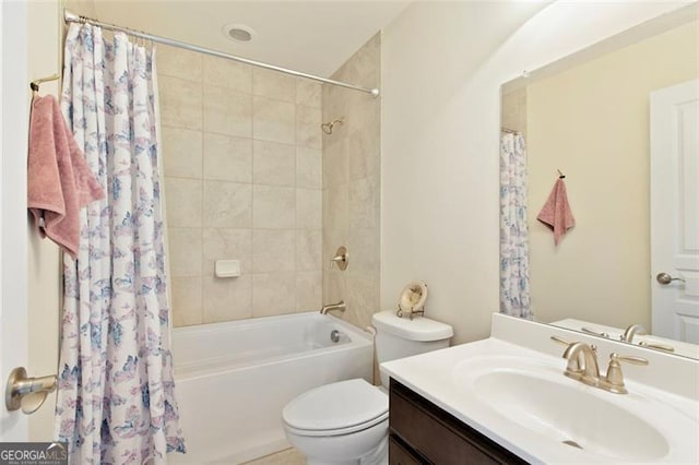 bathroom featuring vanity, toilet, and shower / bathtub combination with curtain