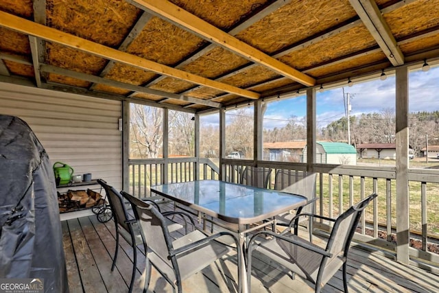 sunroom / solarium featuring a wealth of natural light