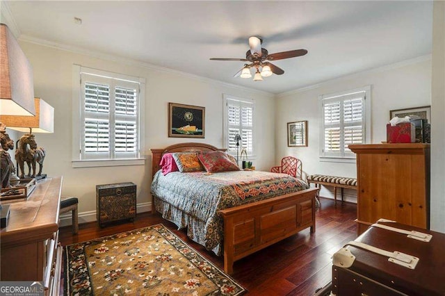 bedroom with multiple windows, crown molding, and hardwood / wood-style flooring