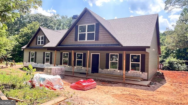 160 Coffey Rd Unit 18, Barnesville, GA 30204 - view of front facade with covered porch, a chimney, and roof with shingles