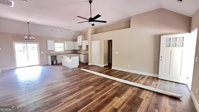 160 Coffey Rd Unit 18, Barnesville, GA 30204 - unfurnished living room featuring a ceiling fan, high vaulted ceiling, a chandelier, and dark wood-type flooring