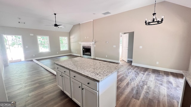 160 Coffey Rd Unit 18, Barnesville, GA 30204 - kitchen featuring a chandelier, a ceiling fan, a fireplace, dark wood-style flooring, and open floor plan