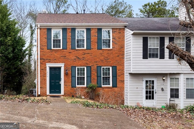 view of front of property featuring brick siding