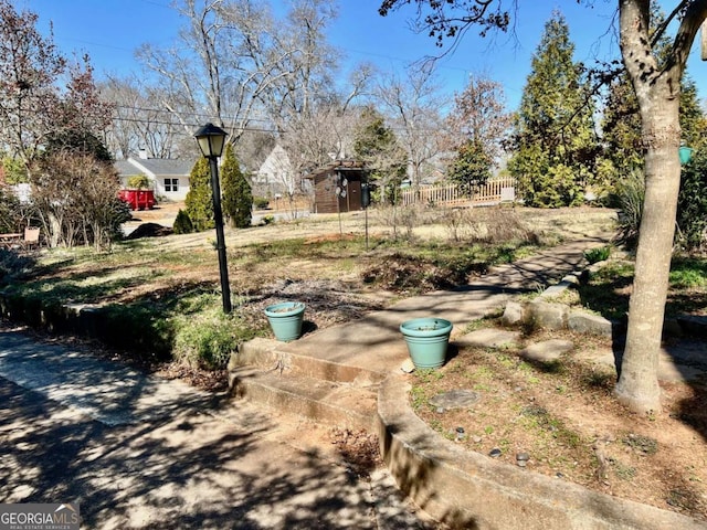 view of yard featuring fence