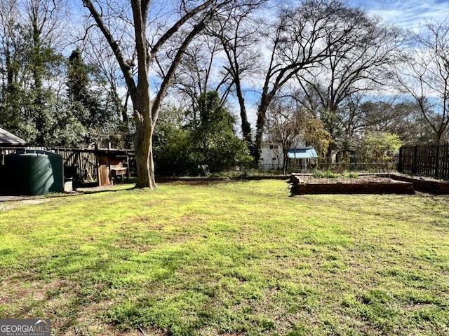 view of yard featuring fence