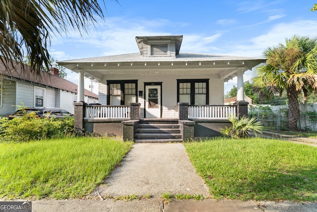 bungalow-style home with covered porch