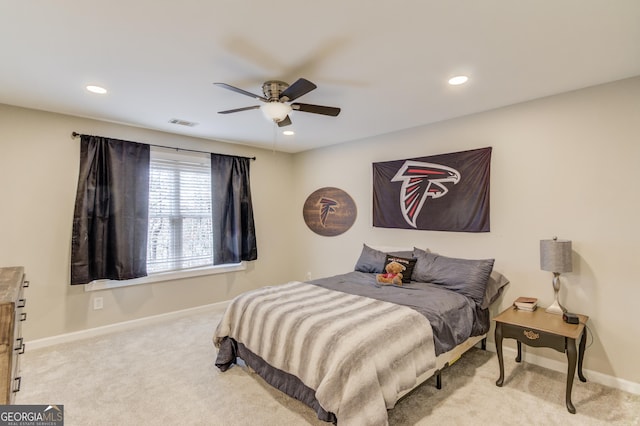 carpeted bedroom with visible vents, recessed lighting, and baseboards