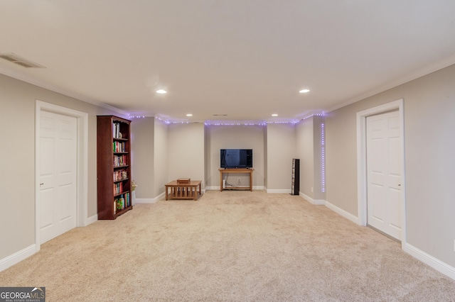 unfurnished room with crown molding, recessed lighting, carpet, and visible vents