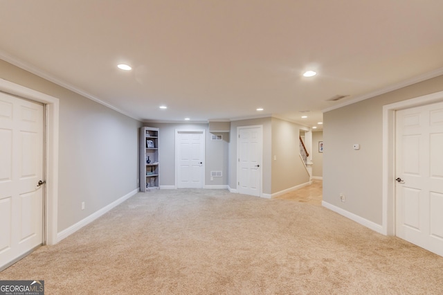 finished basement with light carpet, recessed lighting, crown molding, baseboards, and stairs