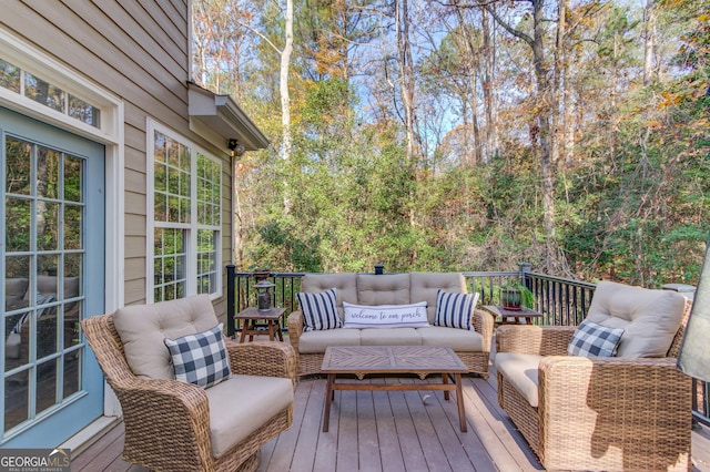 wooden deck featuring an outdoor living space