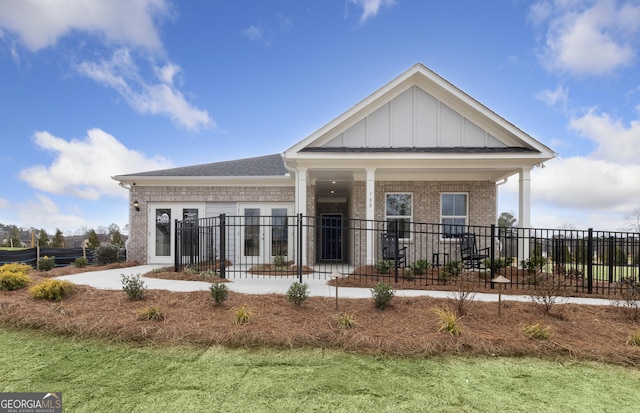 159 Park Ln, Fairburn, GA 30213 - exterior space featuring brick siding, board and batten siding, and fence