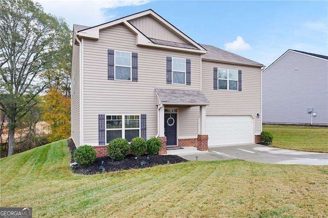 view of front of home with a garage, driveway, a front lawn, and brick siding