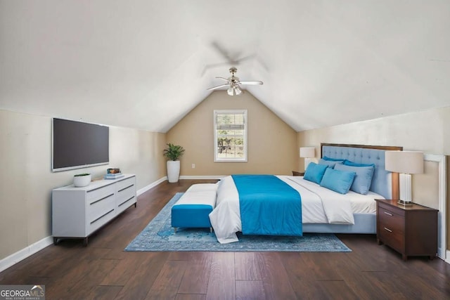 bedroom featuring lofted ceiling, a ceiling fan, baseboards, and wood finished floors