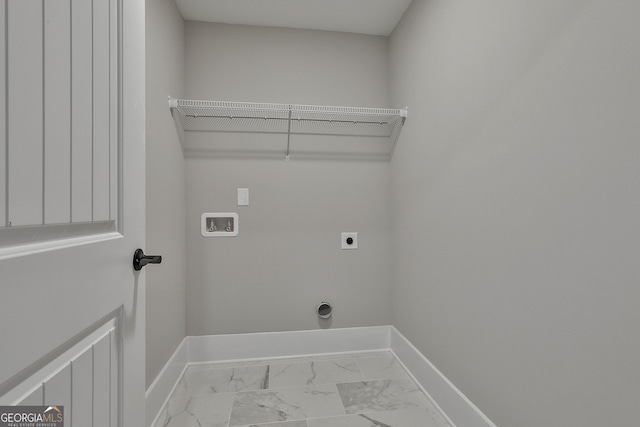 laundry room featuring laundry area, baseboards, marble finish floor, washer hookup, and electric dryer hookup