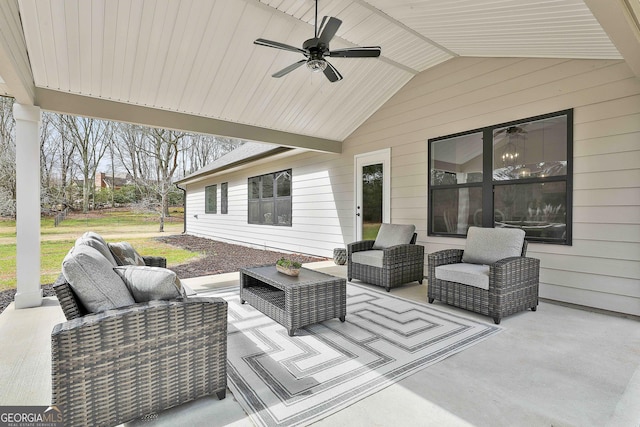 view of patio featuring an outdoor hangout area and a ceiling fan