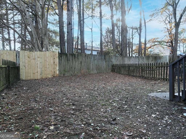 view of yard featuring a fenced backyard